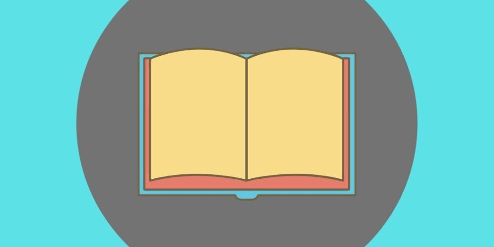 open book on a gray and turquoise background