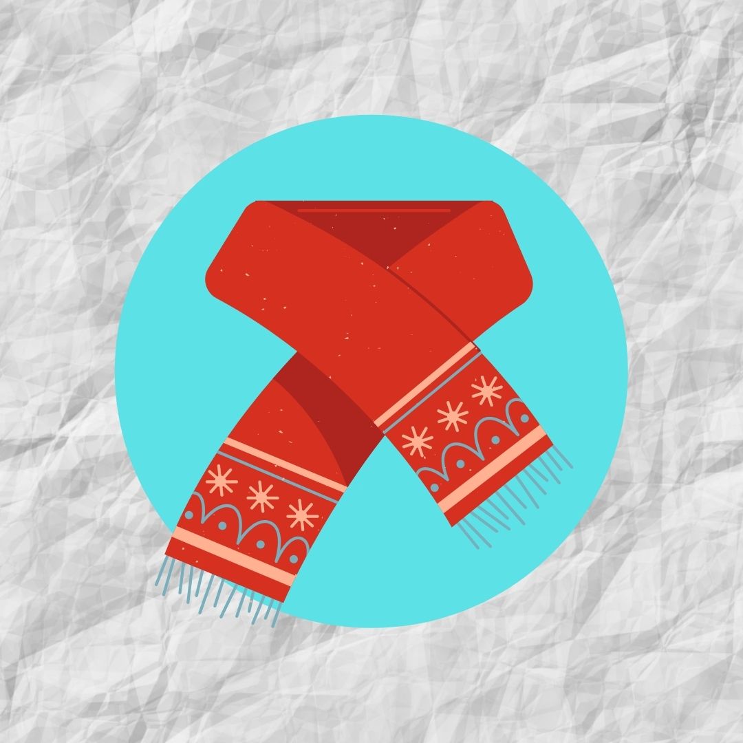 red scarf on teal background and white paper