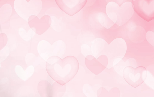 pink hearts floating on a pink background