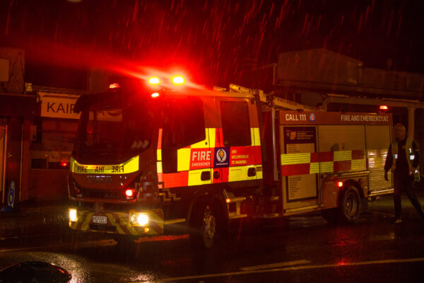 The fire engine leaves the library.